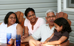 Family members sitting around a table